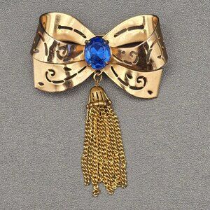 Vintage Coro Gold Pierced Bow Brooch Pin with Blue Stone and Tassel
